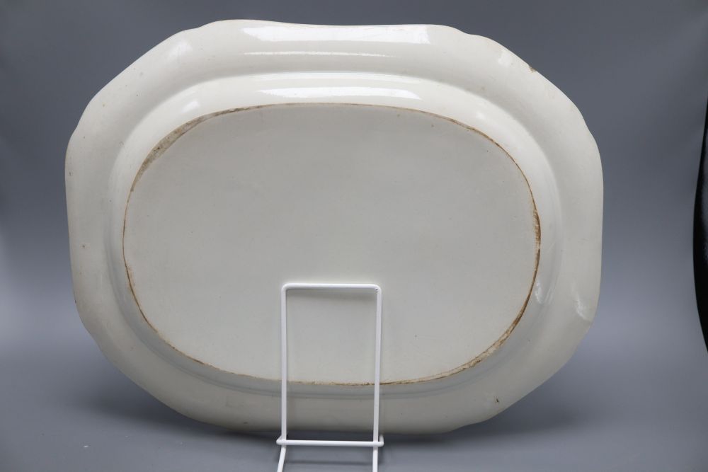 A Victorian blue and white meat plate, depicting scenes from Greek mythology, length 41cm